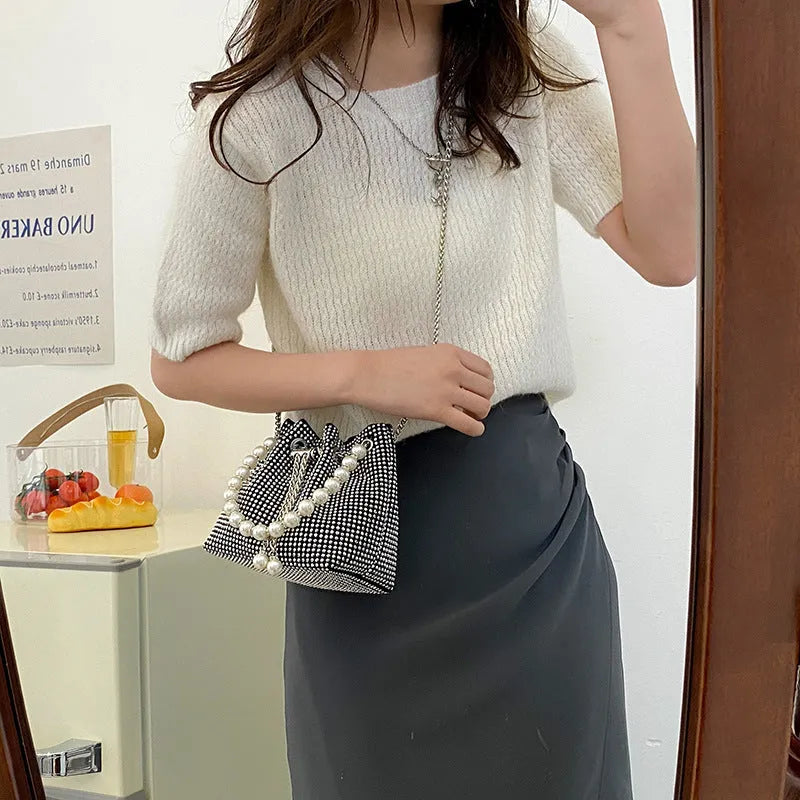 Soft PU leather crossbody bucket bag with diamond decorations and a chain shoulder strap.