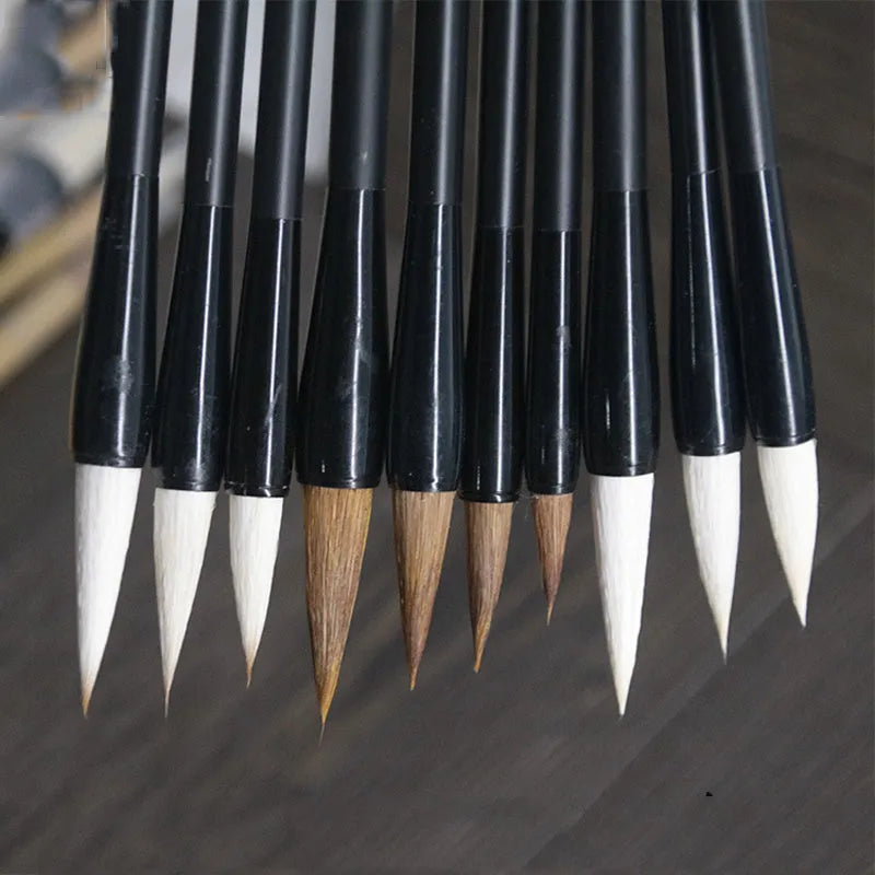 Student Chinese calligraphy brush with steel barrel and wolf hair nib, 23cm long
