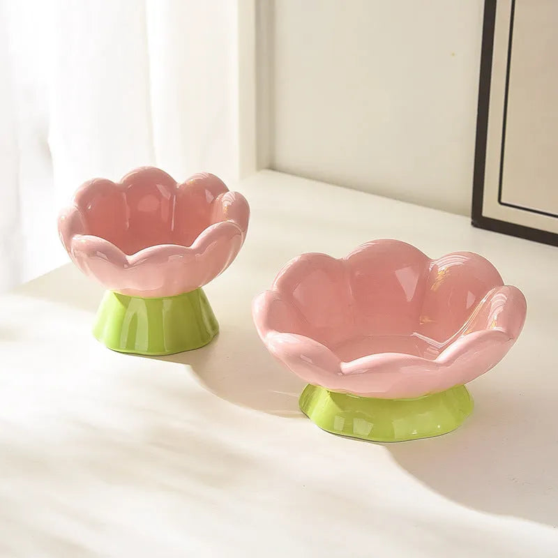 Pink ceramic raised cat bowl with flower shape and non-slip base, 15-degree angle, for small to medium cats