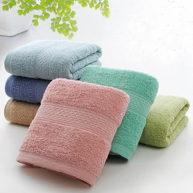 Thickened cotton blend bath beach towel showing colour options including green, blue, brown, and pink