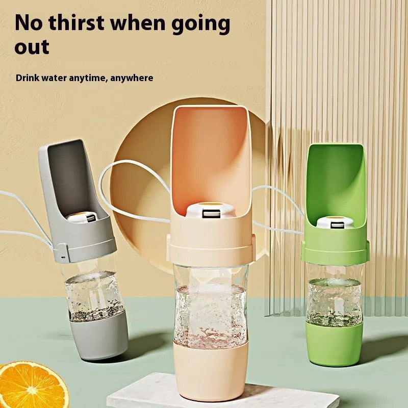 Green 2-in-1 travel dog water bottle with lanyard showing food and water compartments