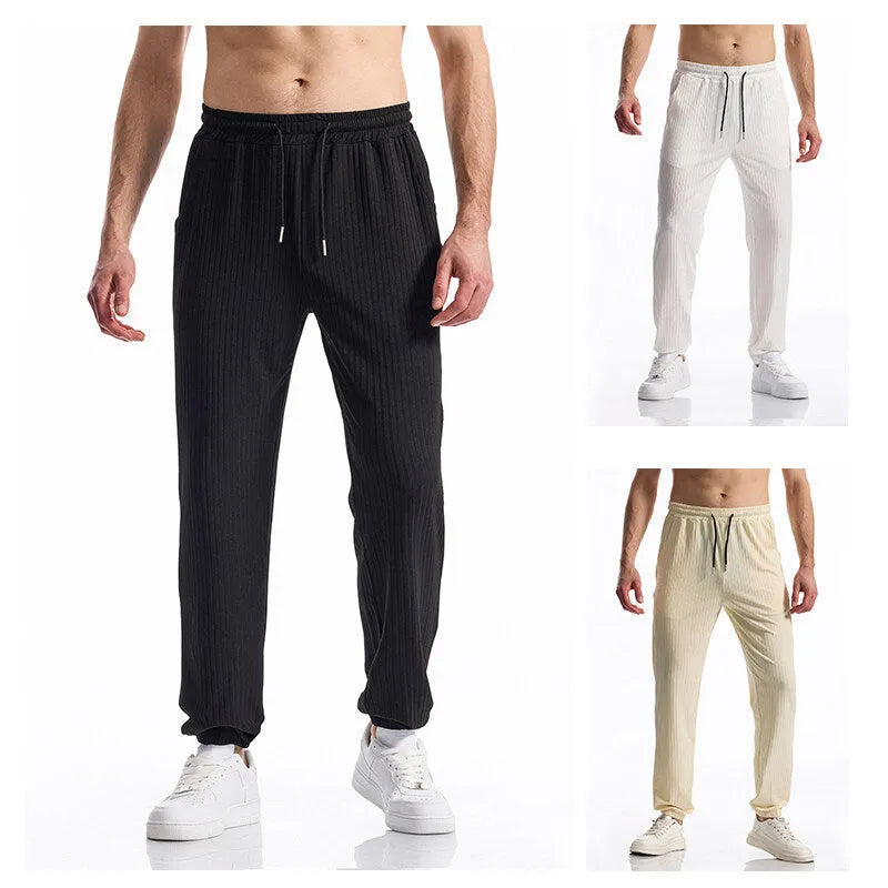 Silky rib fabric casual trousers with baggy straight-leg cut and elastic waistband