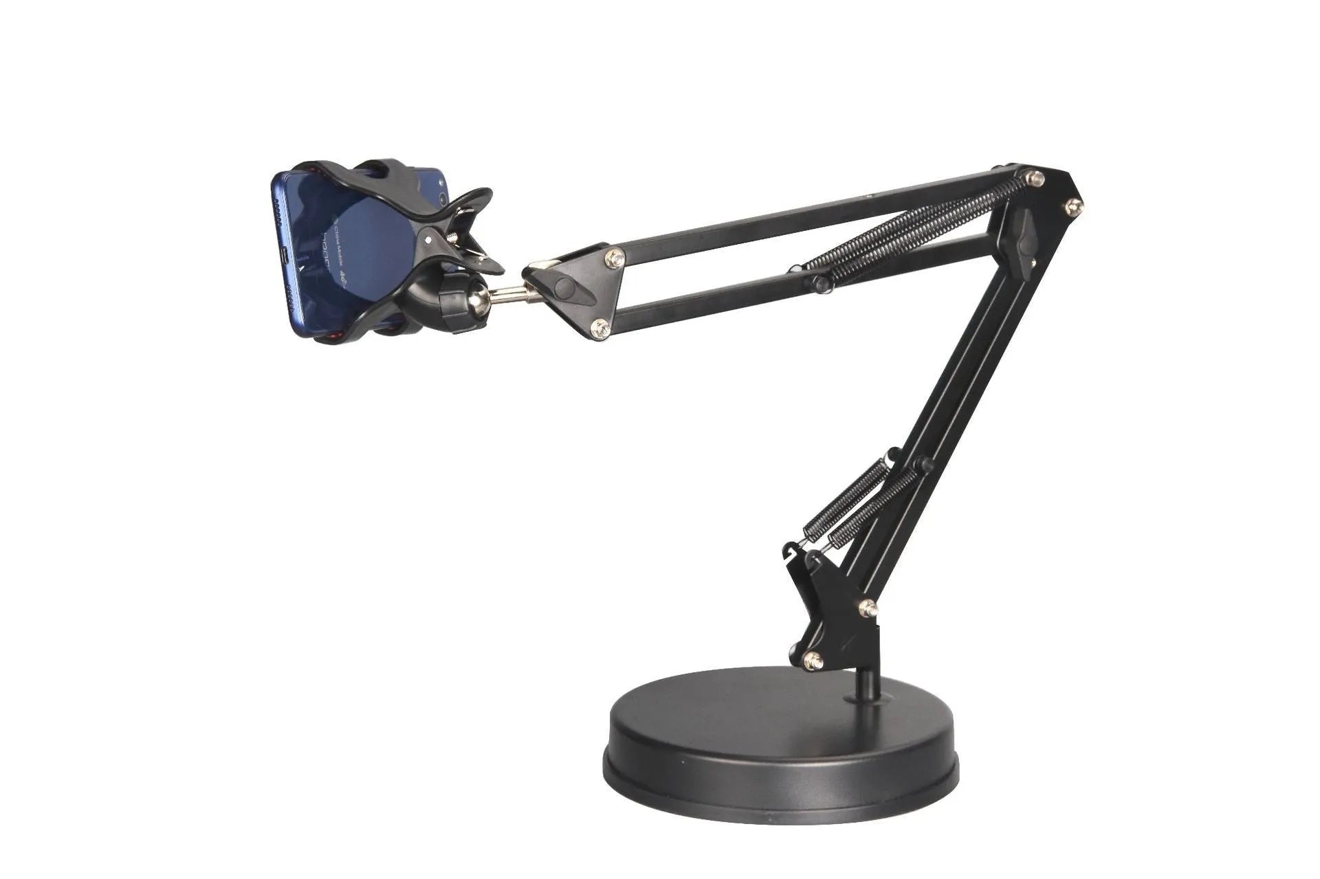 Black universal phone stand with long adjustable metal arm and heavy round base on a desk