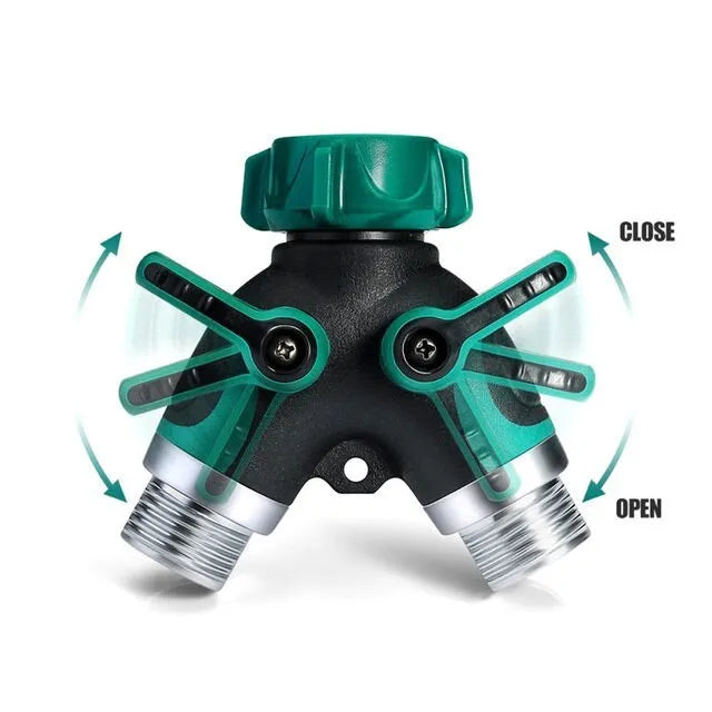 Green plastic Y type double-pass garden hose splitter with two outlets and brass-coloured inlet