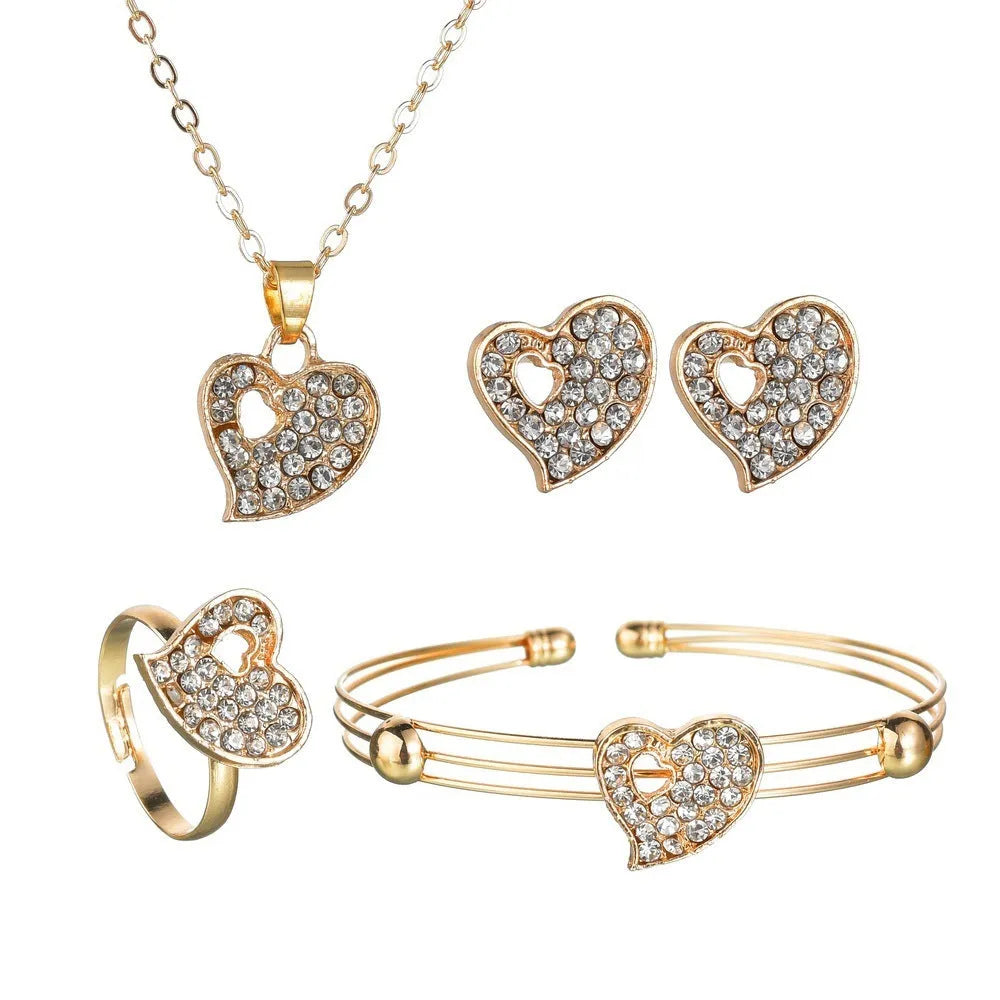 Women's gold electroplated jewellery set with earrings, pendant, and hand decoration featuring love, water drop, and bell patterns
