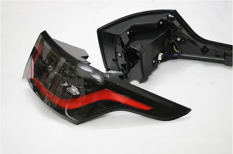 Pair of LED brake light units for car rear bumper, IP66 waterproof rated.