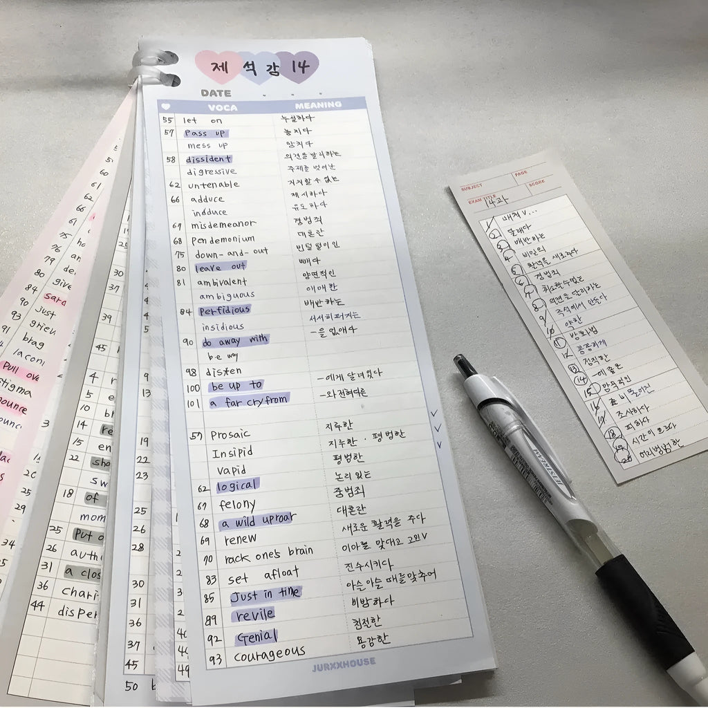 Vertical English word notepad in blue, pink, or purple cover, showing double-sided printed pages.
