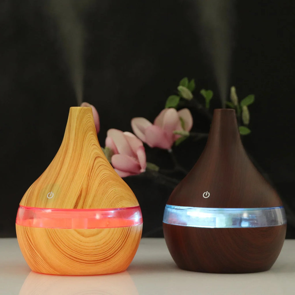 USB mini tip air purifier humidifier in wood grain, columnar shape, less than 1L tank, one fog outlet, 2-8 hour timer.
