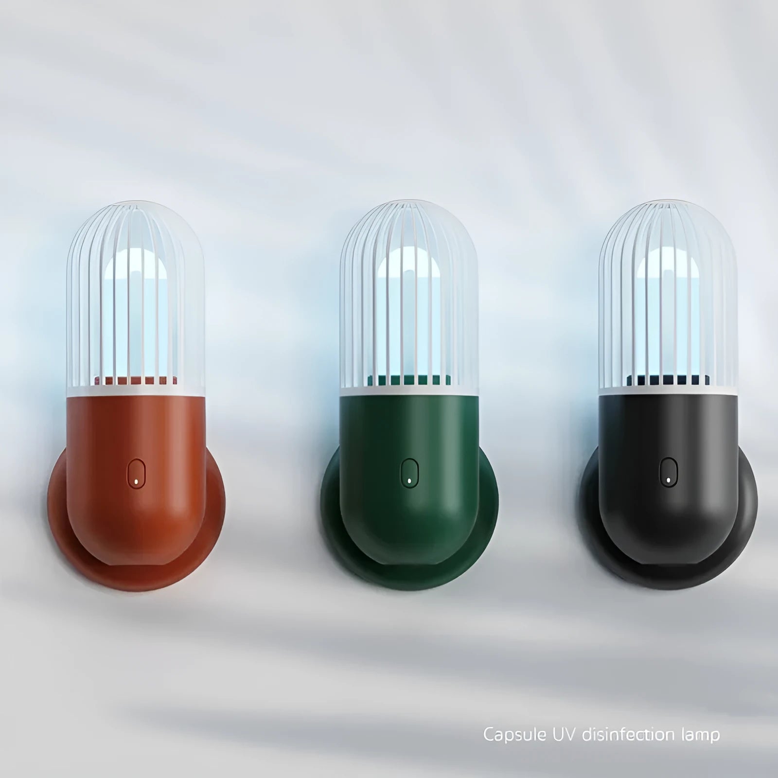 Portable capsule UVC disinfection lamp in four colours with dimensions 64x64x148mm
