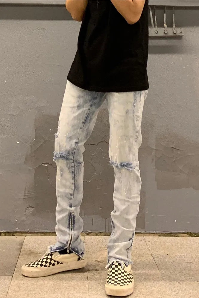 Men's light blue zipper jeans with cotton main fabric, shown in sizes 30 to 36 with waist and length measurements in cm.