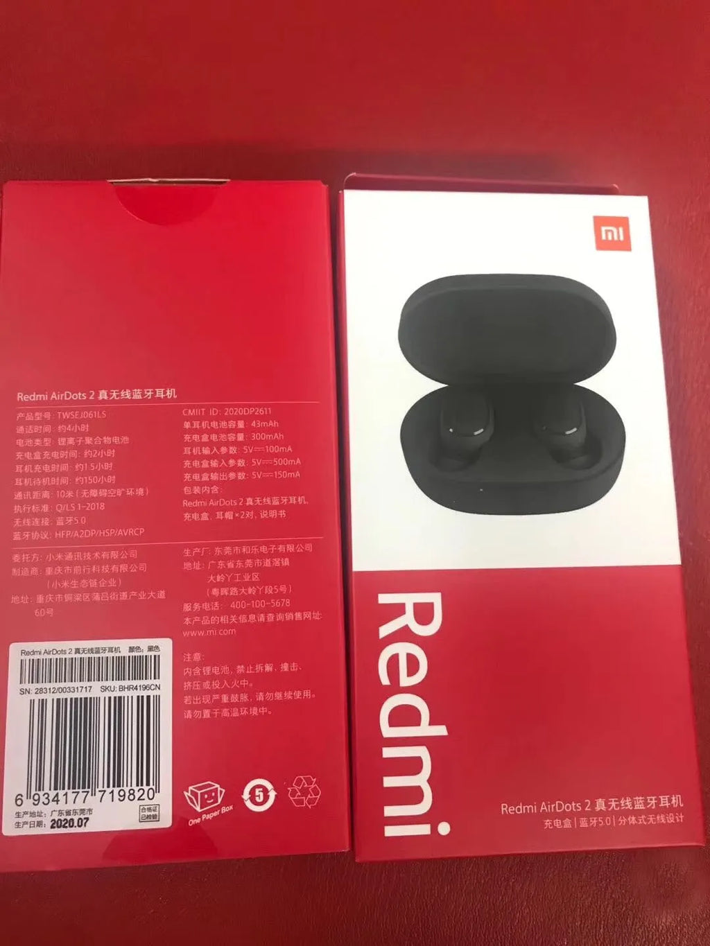 Black Redmi AirDots true wireless Bluetooth earbuds with a charging case.
