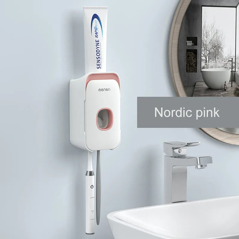 Blue automatic toothpaste dispenser made of ABS plastic mounted on a bathroom wall.