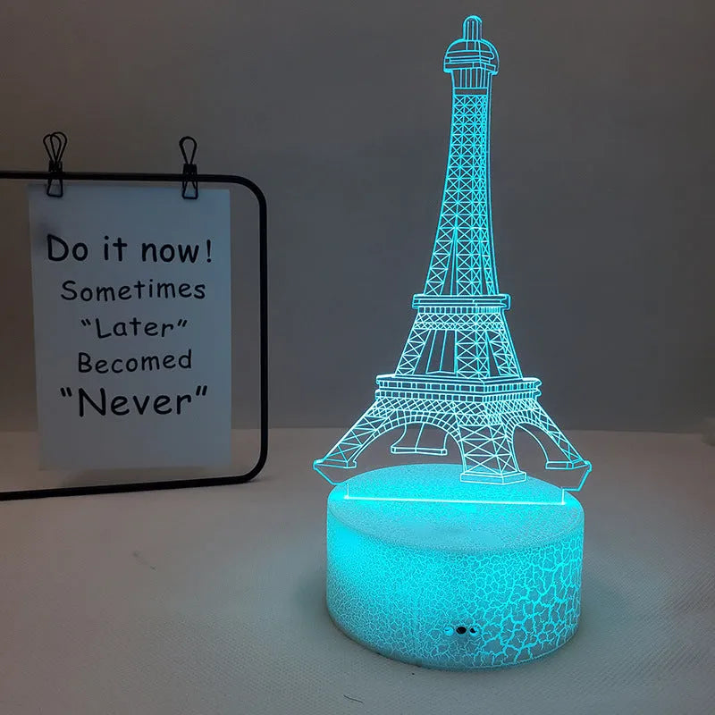 Eiffel Tower shaped table lamp with multi-colour 3D visual slide design and acrylic lampshade.