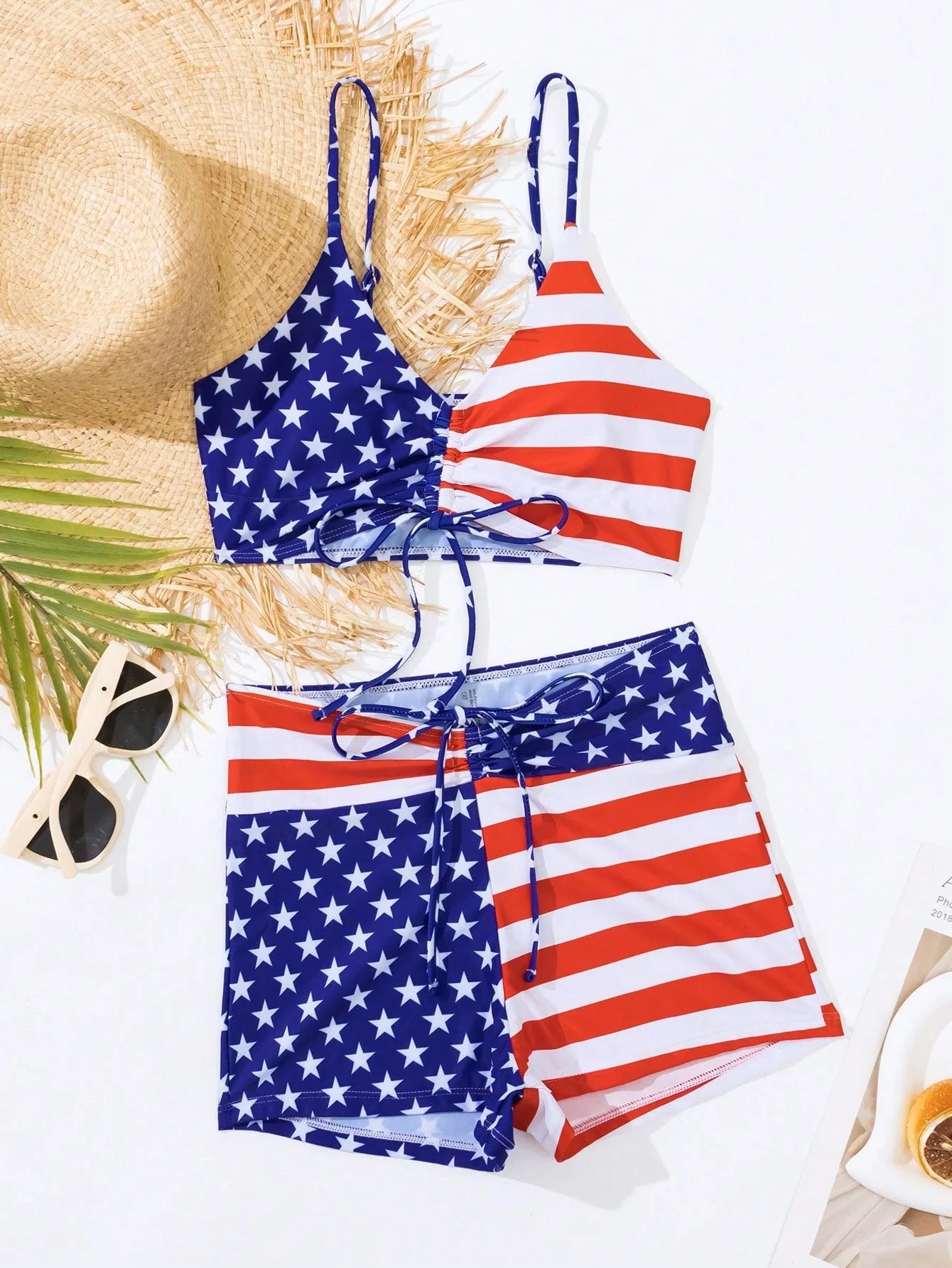 Women's high waist boxer swimsuit with drawstring in red, white, and blue Stars and Stripes pattern.