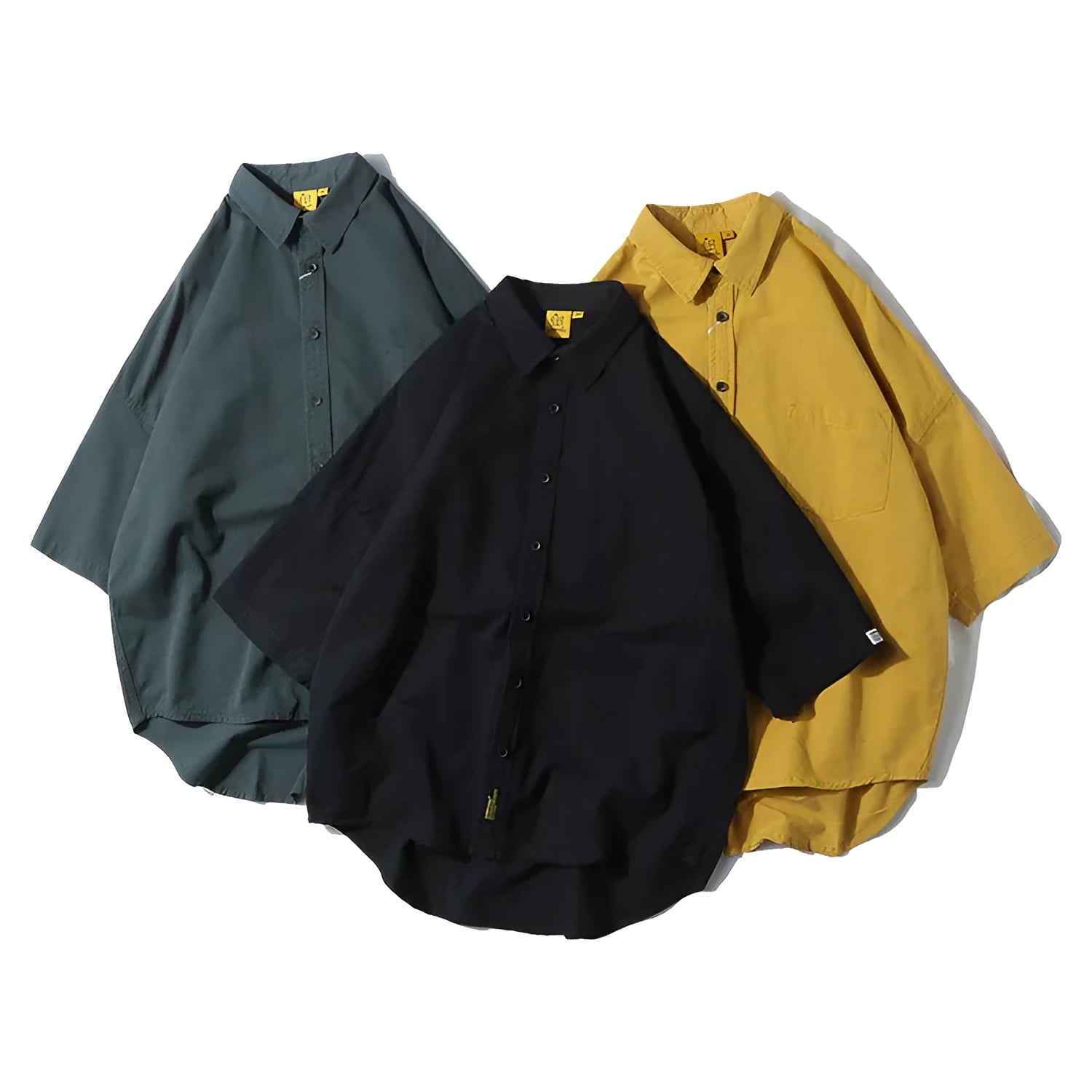 Man wearing a loose-fit Japanese style cotton cardigan shirt in a summer colour.