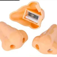 Flesh colour geometry-shaped plastic pencil sharpener for manual use.
