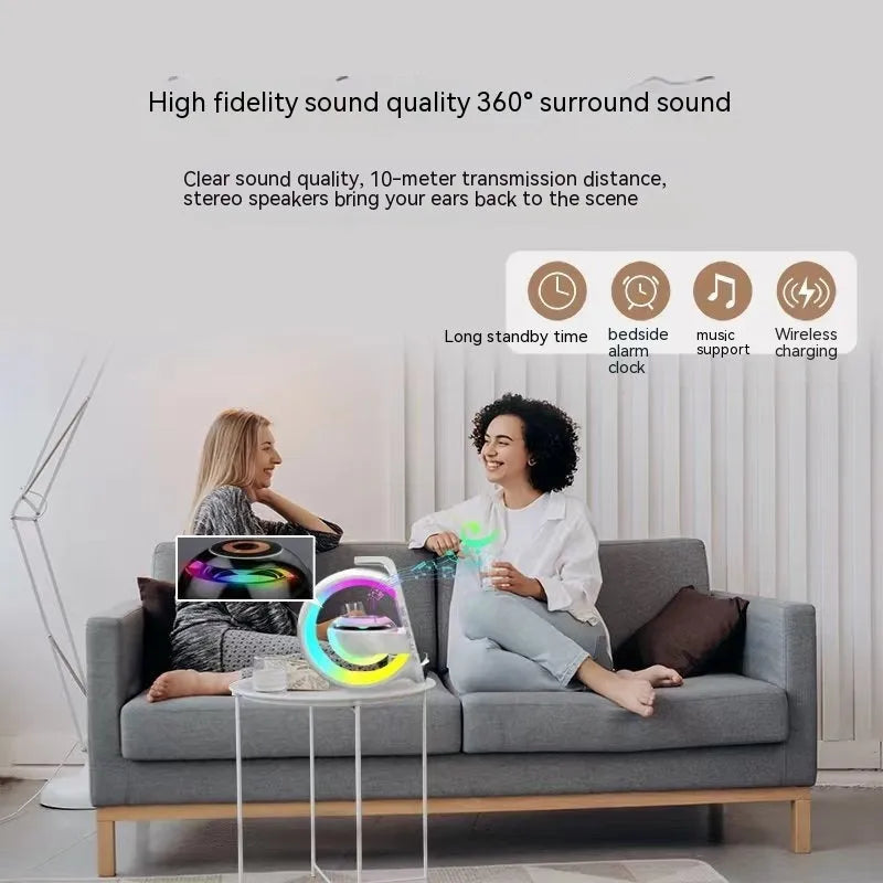 White Bluetooth speaker six-in-one wireless charger with ambience light and dual microphones for home karaoke