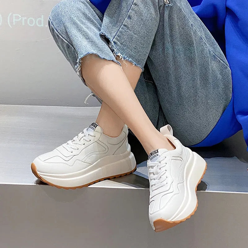 Women's white cowhide leather casual sports shoes with round toe, cross strap, and English muffin heel