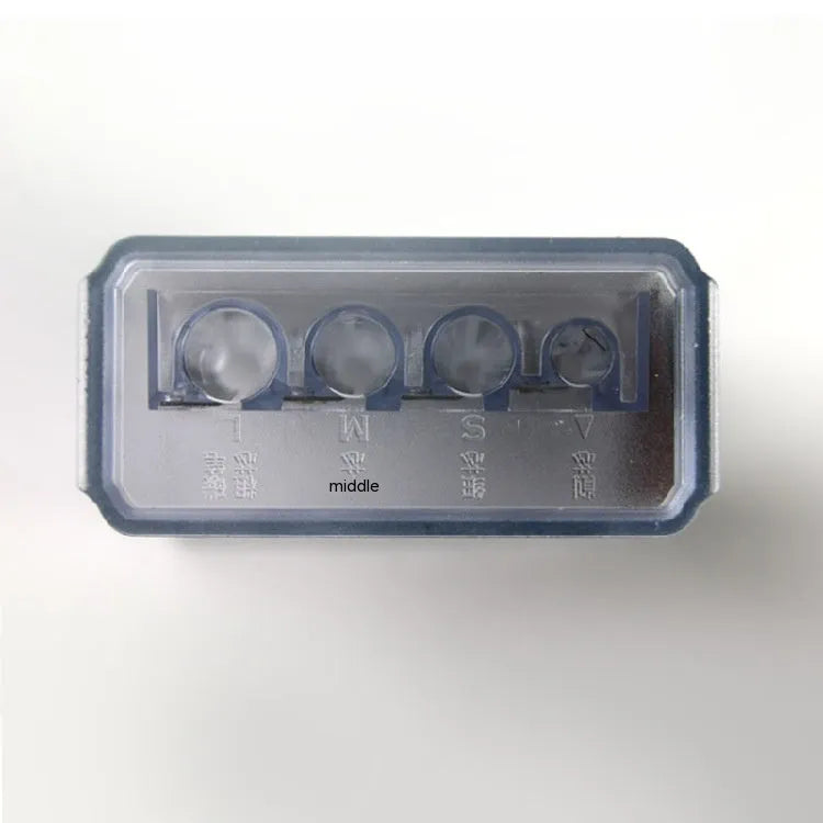 Geometric plastic pencil sharpener with four holes, four blades, and an integrated screwdriver.