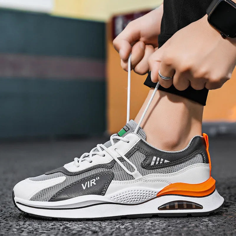 Men's grey mesh running shoes with round toe and lightweight sole for jogging