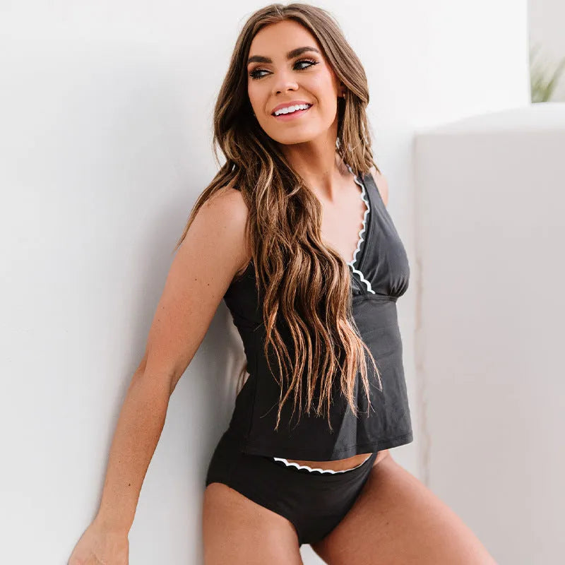 A black sleeveless women's nylon bikini set on a mannequin.