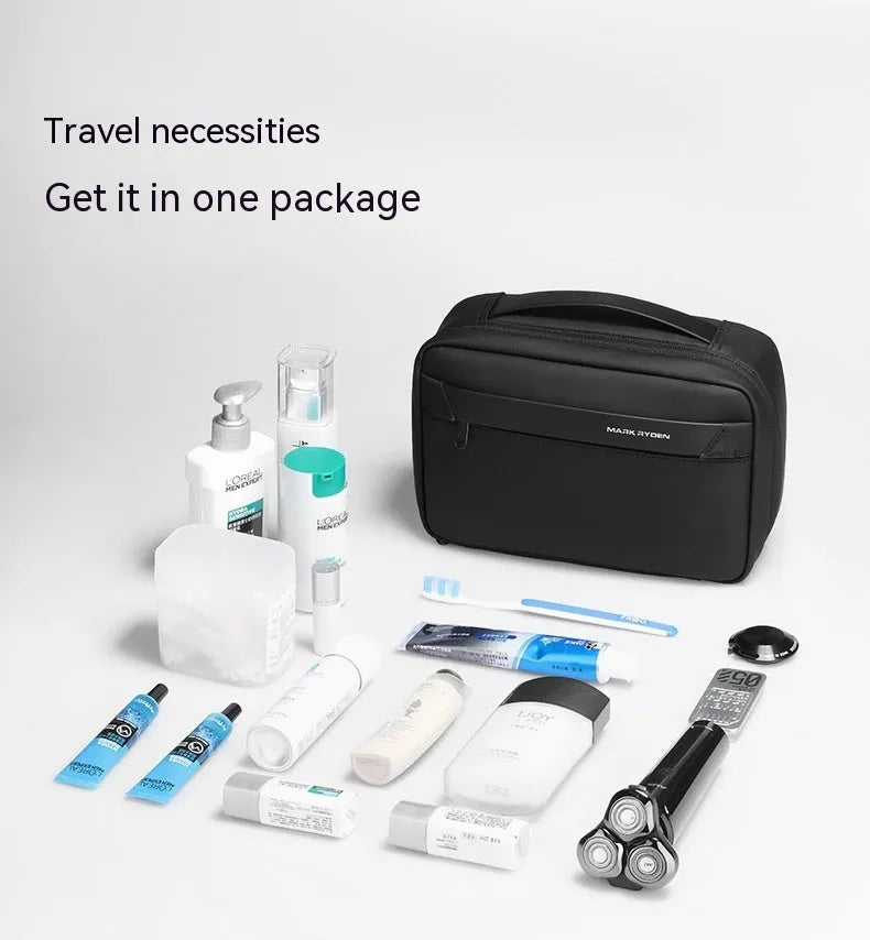 Black Oxford cloth toiletries bag with multiple compartments open, showing wet-dry separation design.