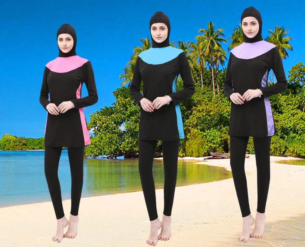 Women's black long sleeve hooded swimsuit with rose red trim, shown as a two-piece set for swimming.