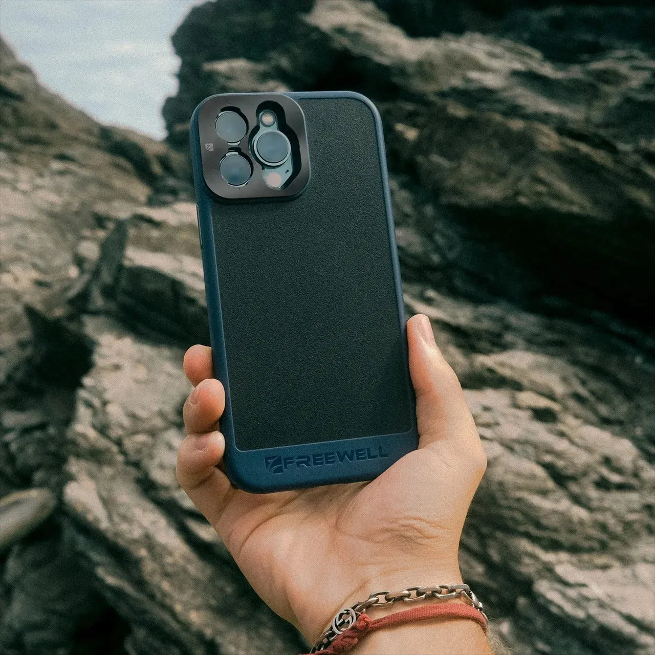 Black universal phone case compatible with iPhone 13 Pro, 14 Pro and 15 Pro series models.