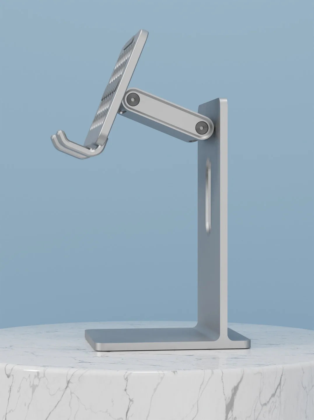 Silver aluminium alloy adjustable desktop stand with phone holder on a desk