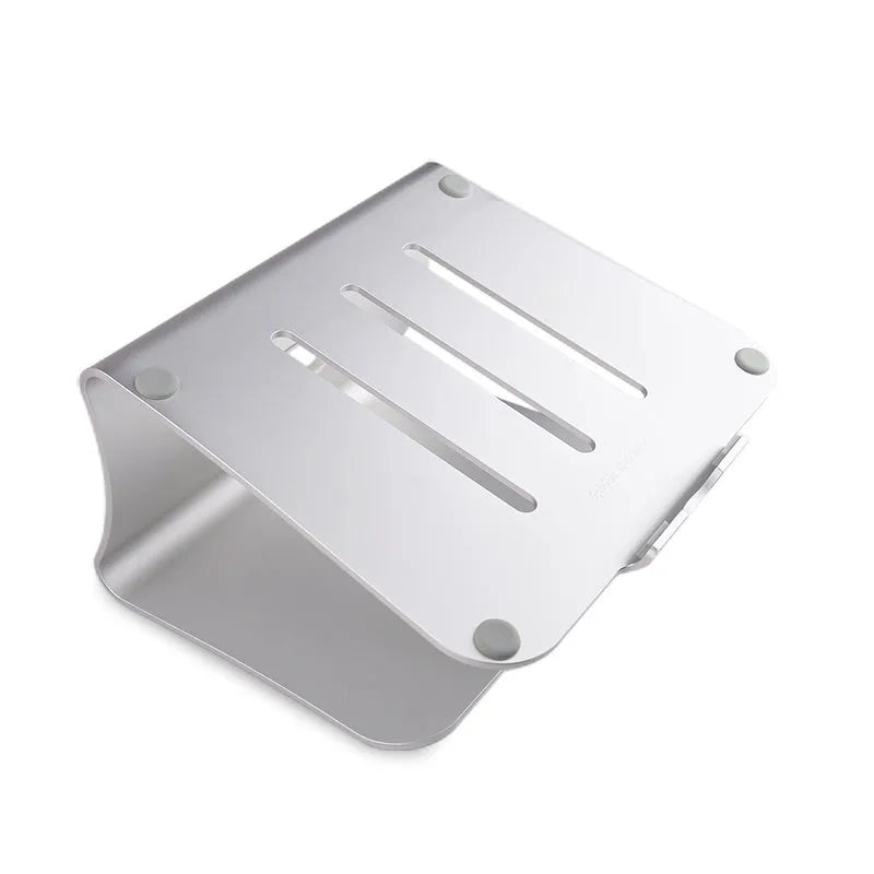 Silver aluminium laptop cooling stand with rotary base on a wooden desk, elevating a laptop.