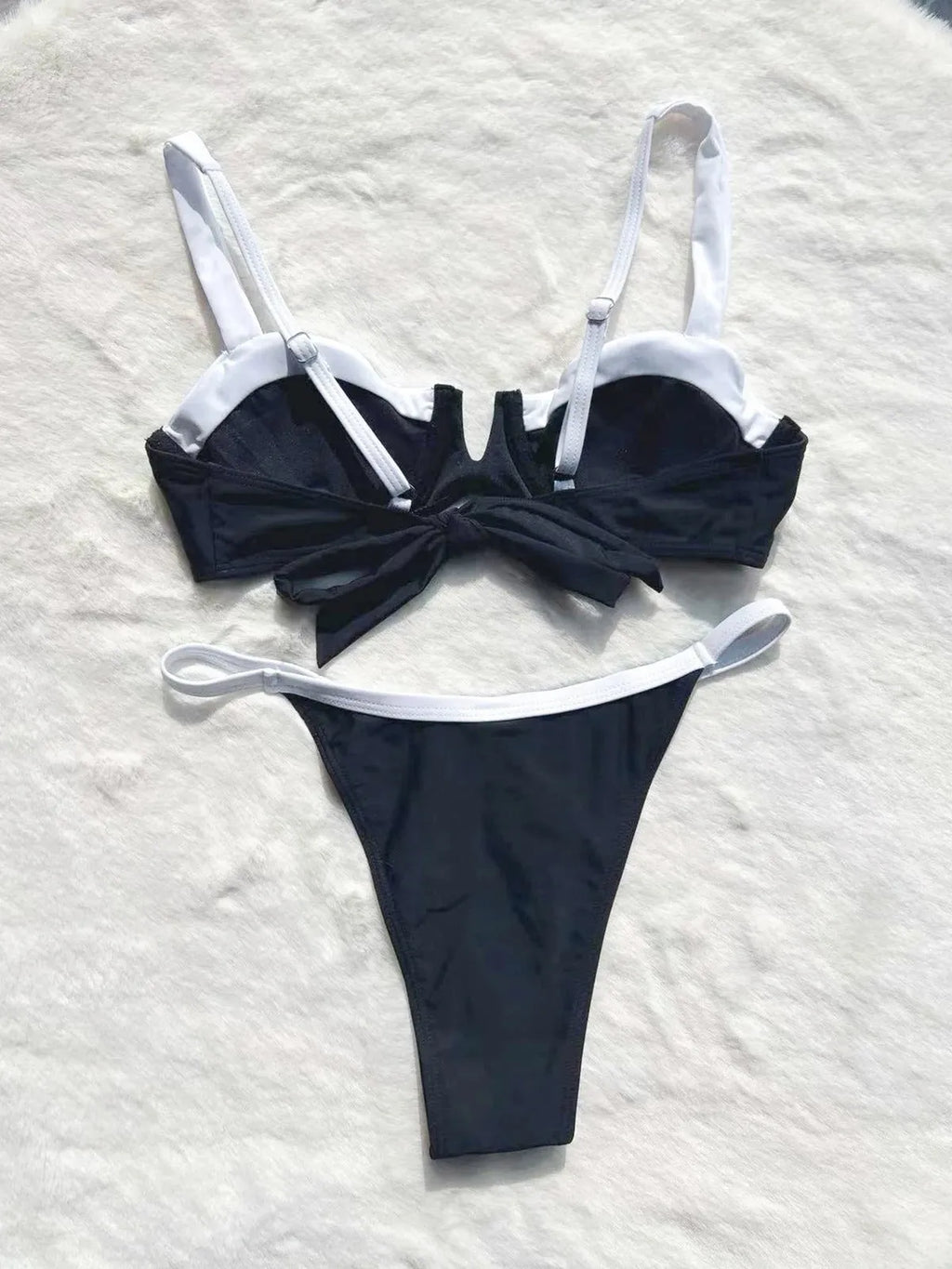 Black low waist bikini swimsuit for women with stitching split details on briefs-style bottoms