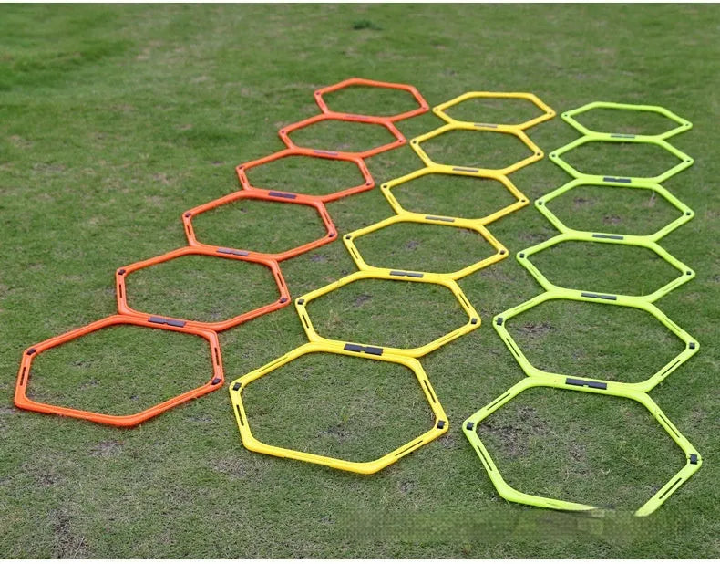 Set of six foldable hexagon football agility training rings in yellow, green, and orange colours.