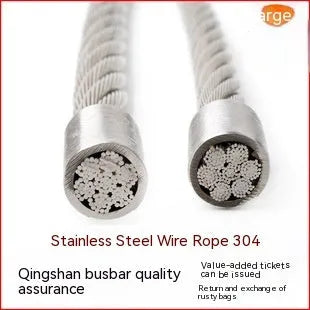 Coiled 304 stainless steel anti-theft security wire rope with a black coated finish on a grey background.