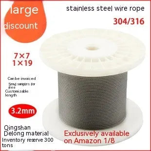 Coiled 304 stainless steel anti-theft security wire rope with a black coated finish on a grey background.