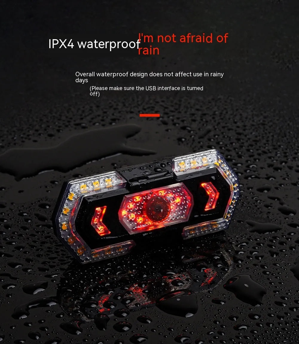 Black wireless remote control motorcycle turn signal taillight with USB charging port.