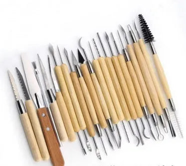 Brown pottery clay tool set with 27 stainless steel, wood and plastic sculpting tools in storage bag