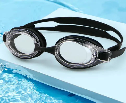 Black myopia swimming goggles with a protective case on a blue background.