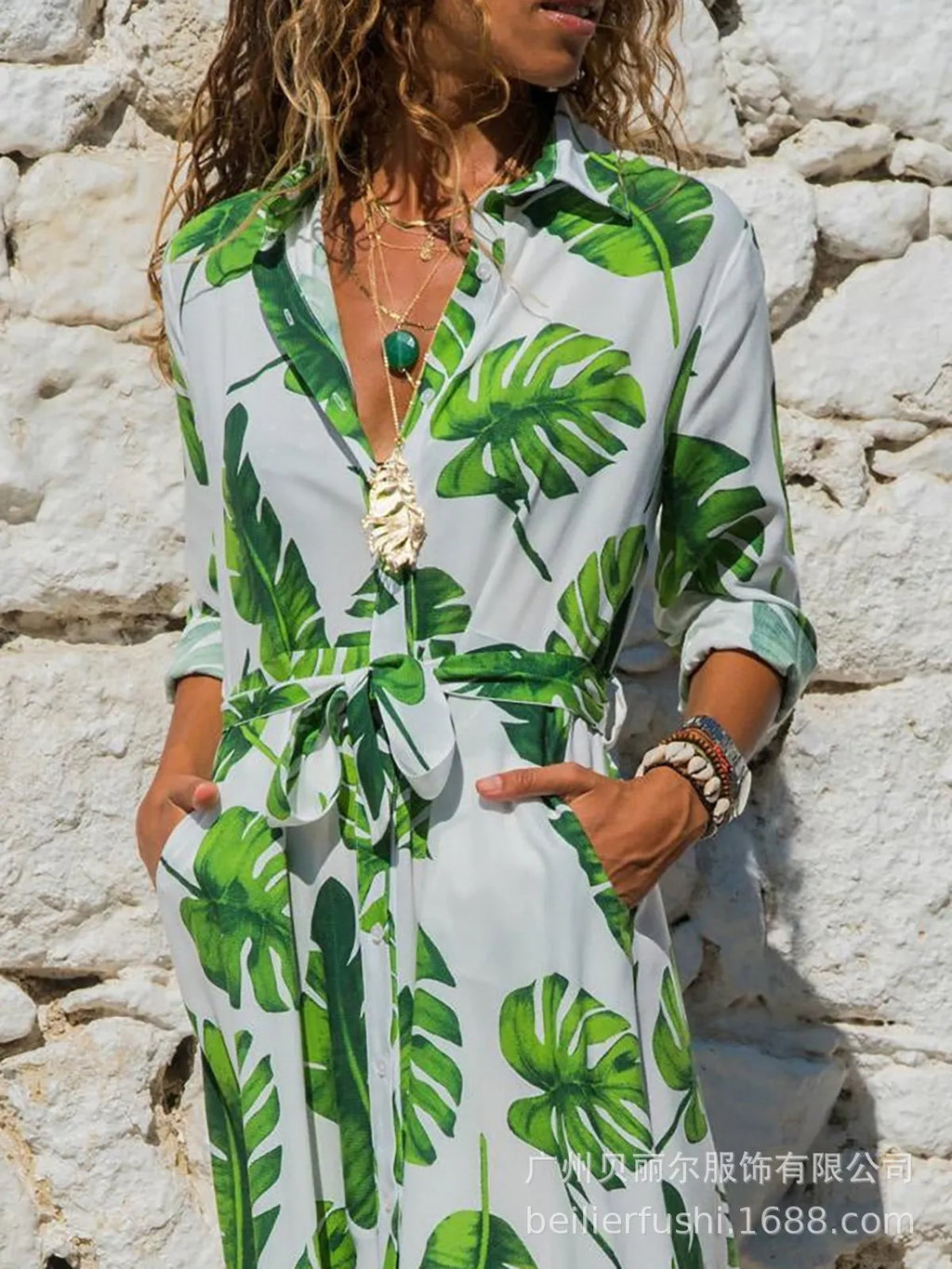 Women's printed chiffon V-neck dress with high waist and A-line skirt on a hanger.
