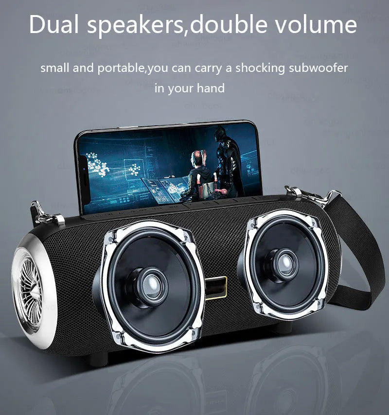 F666 square portable Bluetooth speaker with shoulder strap, phone stand, and retractable FM antenna.