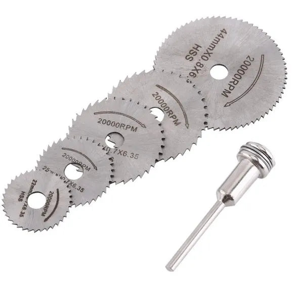 Set of six circular metal saw blades with a central mandrel hole on a white background