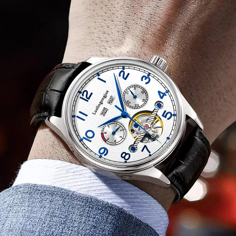 Men's stainless steel mechanical watch with sapphire glass on a leather strap.