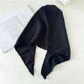 Women's solid colour triangle cloth headscarf in a neutral tone, displayed flat for easy viewing