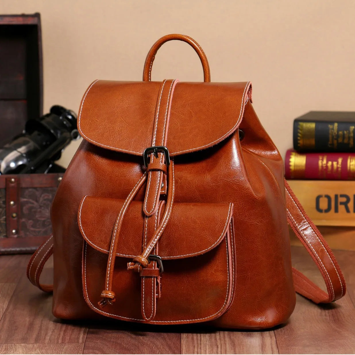 Korean style black cowhide leather backpack with front pocket and pull-belt
