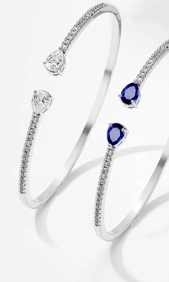 Multi-zircon copper bracelet with inlaid treatment in simple style, shown in blue and white colour options