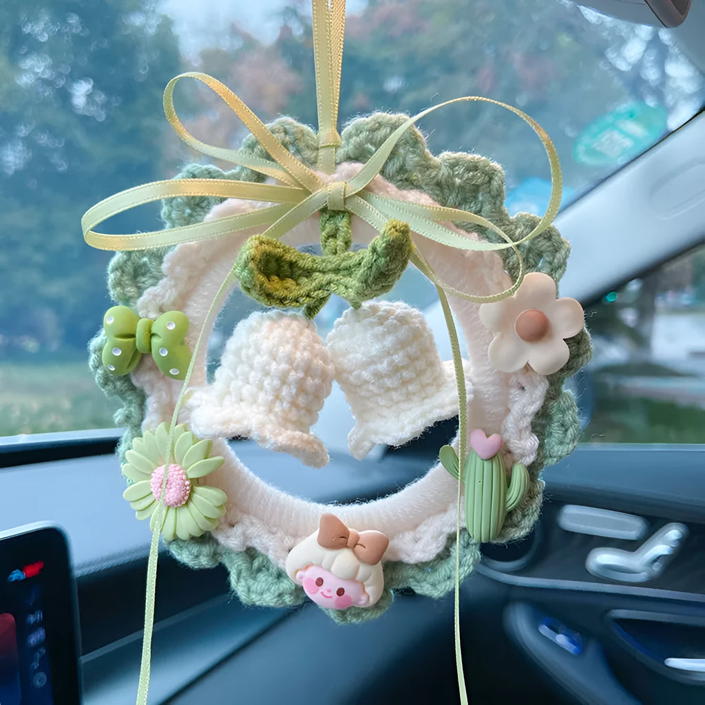 Handwoven wool bell orchid car pendant in green, pink, purple, or yellow colours.