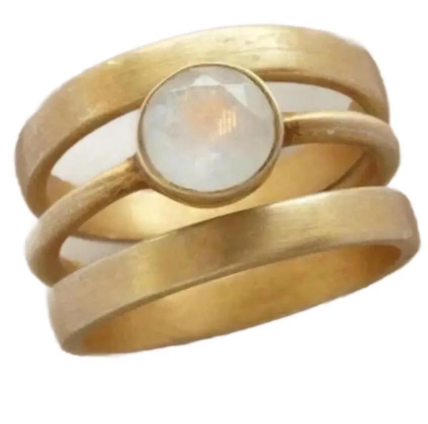 Gold-plated geometric titanium steel ring with a micro-inlaid white chalcedony stone.