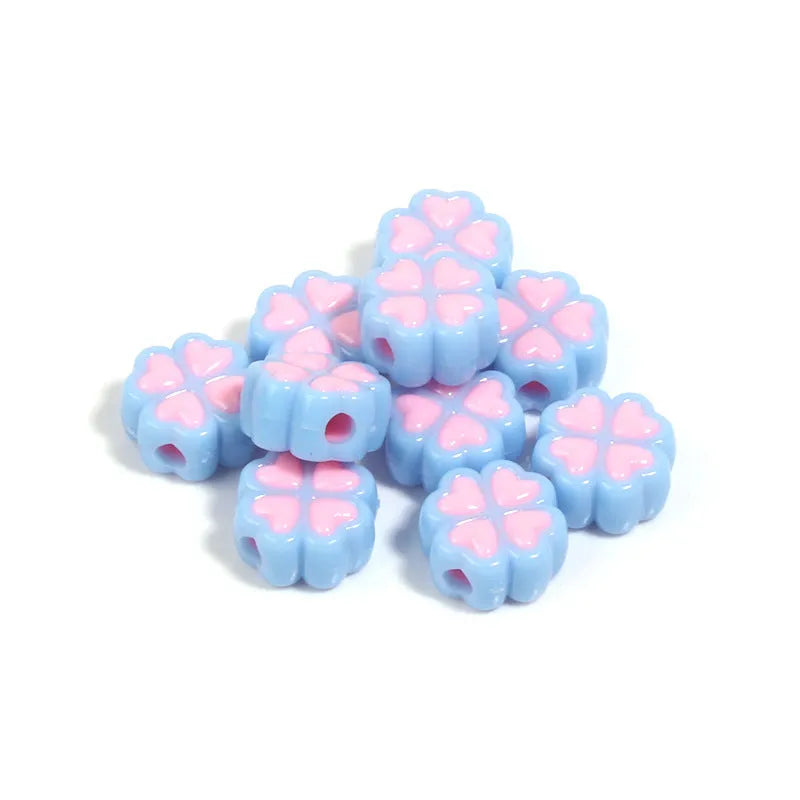 15mm acrylic clover craft beads with frosted finish in multiple colours including pink, blue, yellow, and green