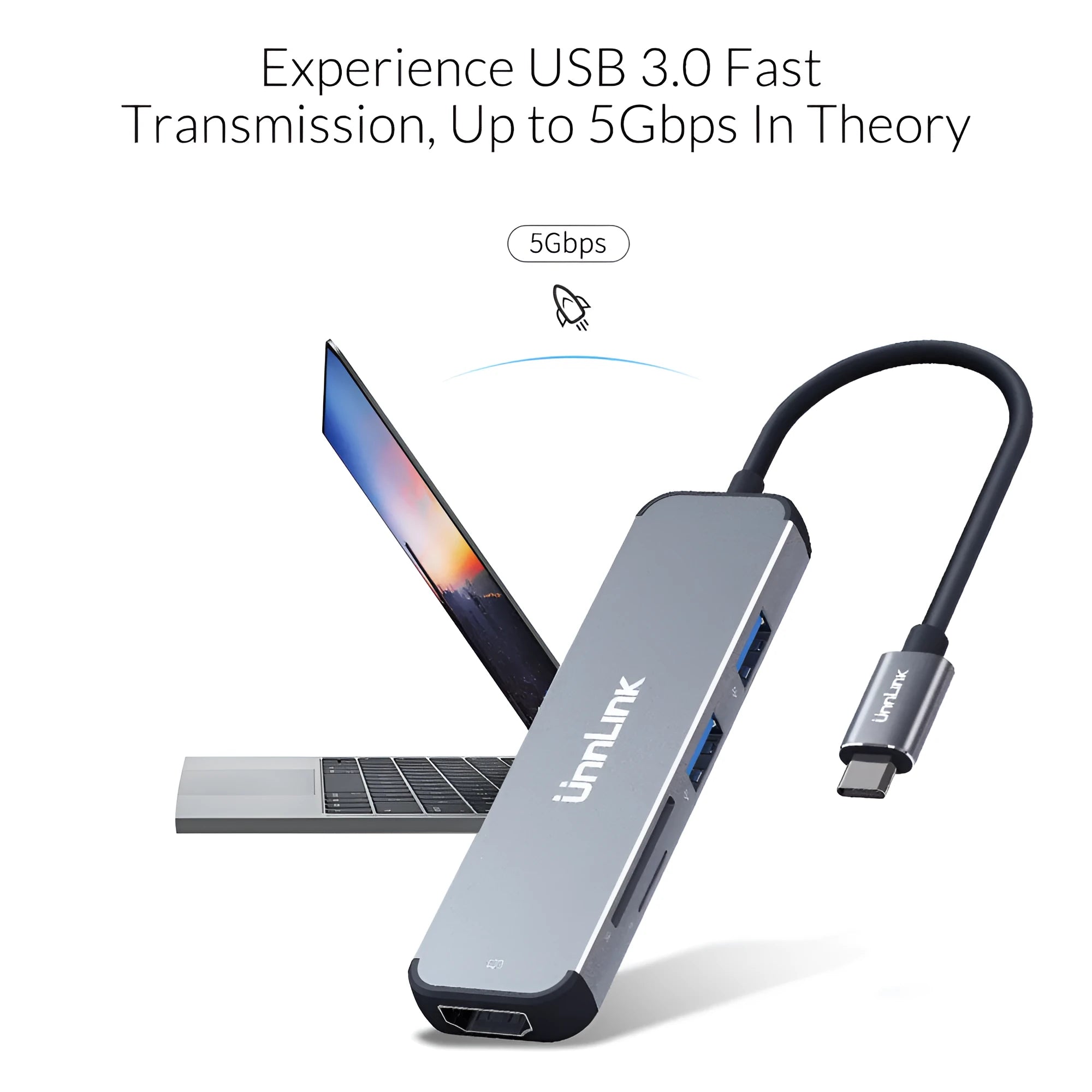 Silver aluminium alloy type-C docking station with HDMI, SD/TF card reader, and USB 3.0 ports on a desk