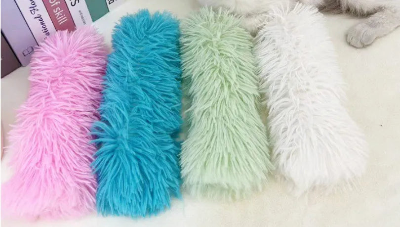 Soft plush cat toy pillow in green, white, blue, or pink, measuring 27x10 cm.