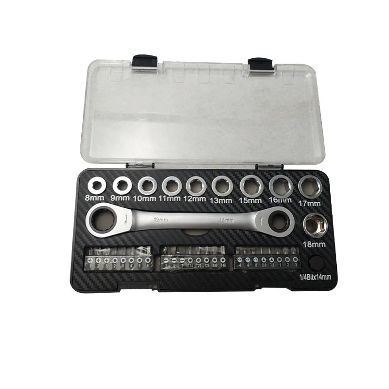 Ratchet wrench set with sockets and bit heads on grey background
